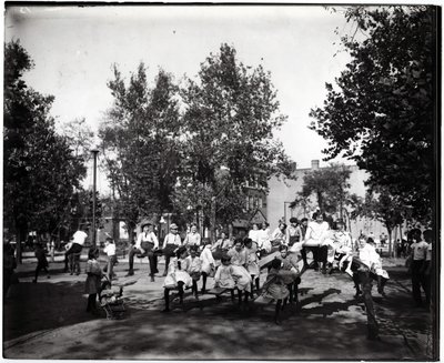 Children Playing on Seesaws in a Park by Unknown